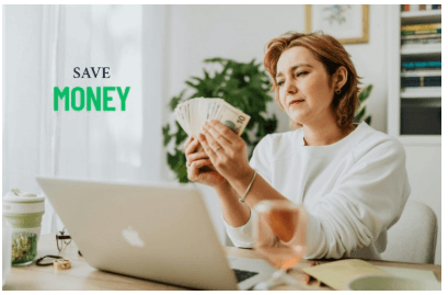 A woman holding a currency with "Save Money" written on it